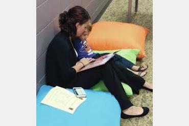 parent and child reading together